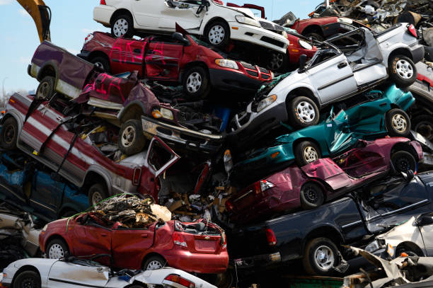 Stacked car parts in junkyard