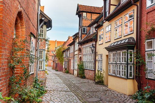 Street with Medieval old brick buildings. Luneburg. Germany