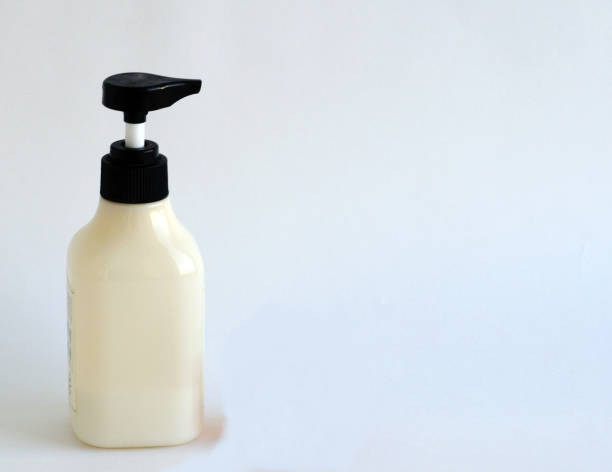 istock Bottle with dispenser for rinsing the mouth with a healing solution. On a white background. Space for text. 1155497978