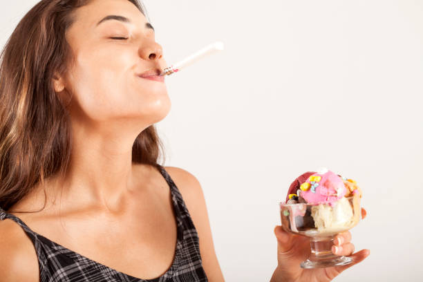 Picture showing sporty woman with donut after workout