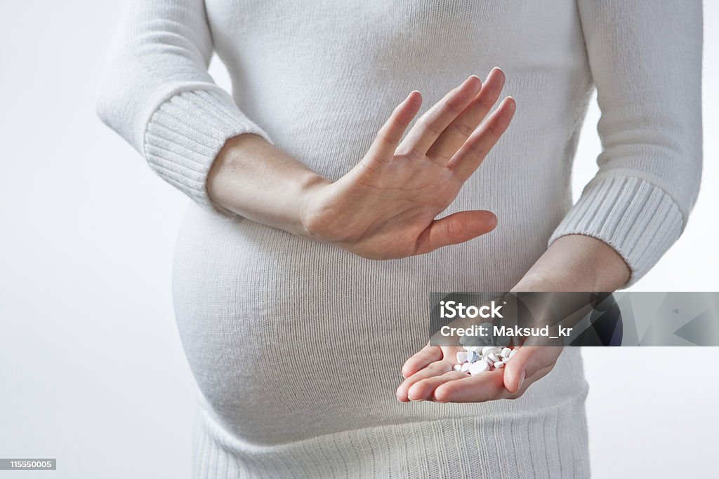 Grossess'et les médicaments - Photo de Abdomen libre de droits