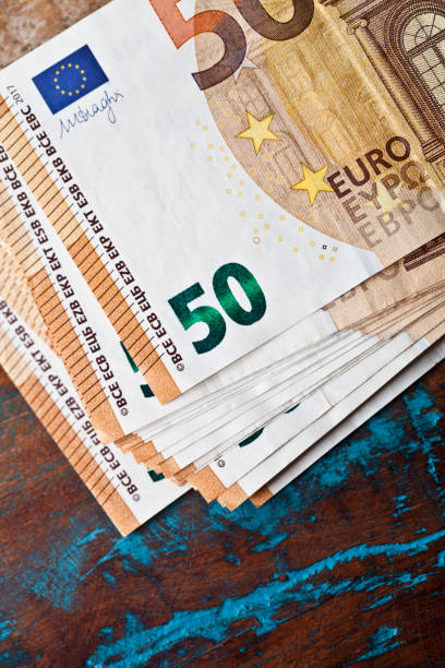 istock Fifty euro banknotes. 50 currency notes stacked. 1155500561