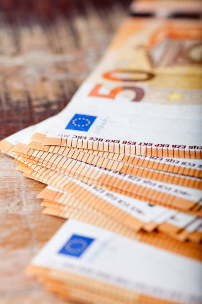 istock Fifty euro banknotes. 50 currency notes stacked. 1155503229
