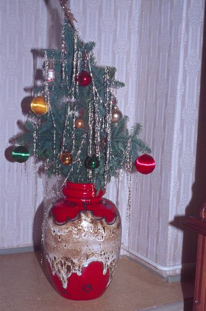 istock Christmas decoration in a big lava vase 1155506556