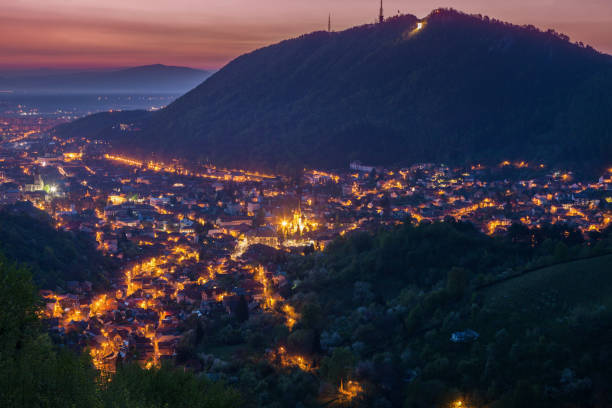 istock Aerial panorama of Brasov at dawn 1155508541