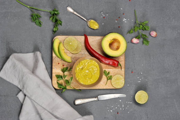 istock Mexican sauce guacamole in a bowl. View from above. 1155508735