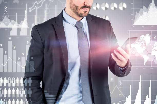 istock Businessman with phone, infographics 1155509157