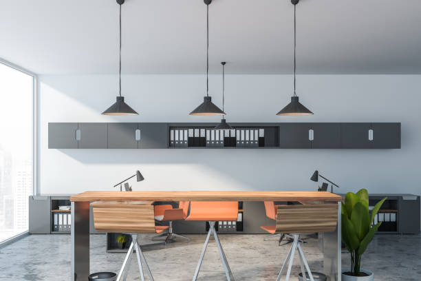istock White office with beige chairs and gray shelves 1155510102