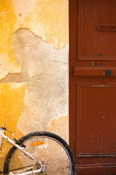 Street with green bicycle and window shutters, Vela Luka, island of Korcula, Croatia