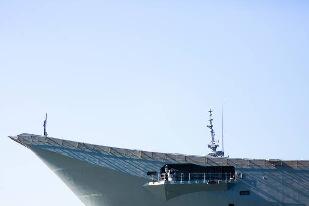 istock Navy ship bow against blue sky background with copy space 1155510288