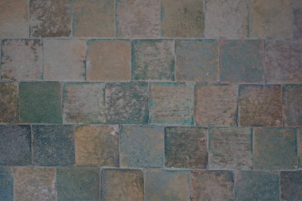 istock Texture of a multi-colored floor tiles of ancient building 1155511567