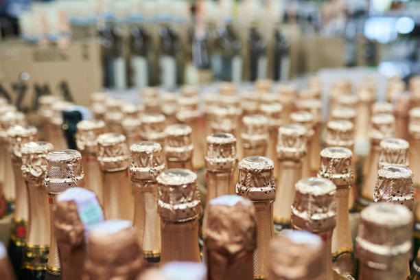istock Sealed champagne bottles, background texture 1155514999