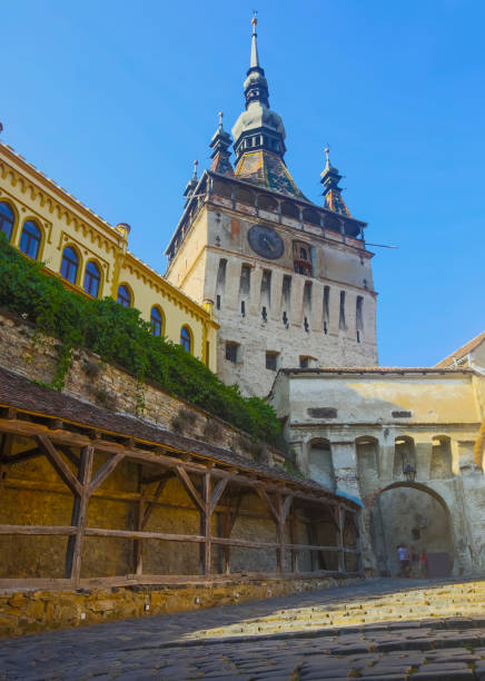 istock Clock tower from fortress square in Sighisoara, Romania 1155516172