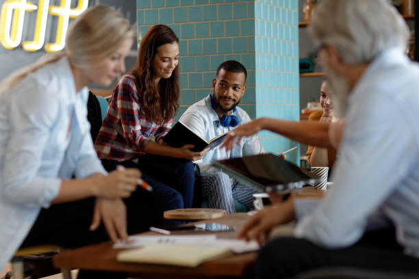 istock Business meeting in a cafe 1155523945
