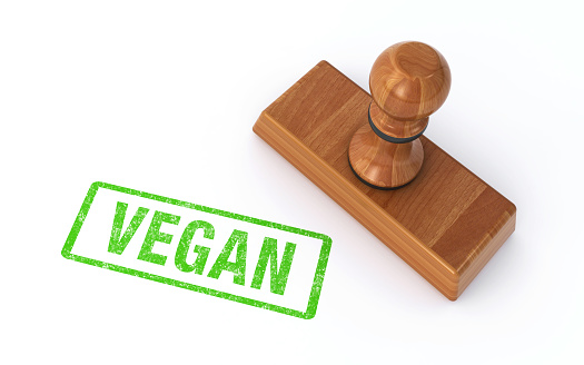 3d rendering of a rubber stamp vegan, isolated on white background