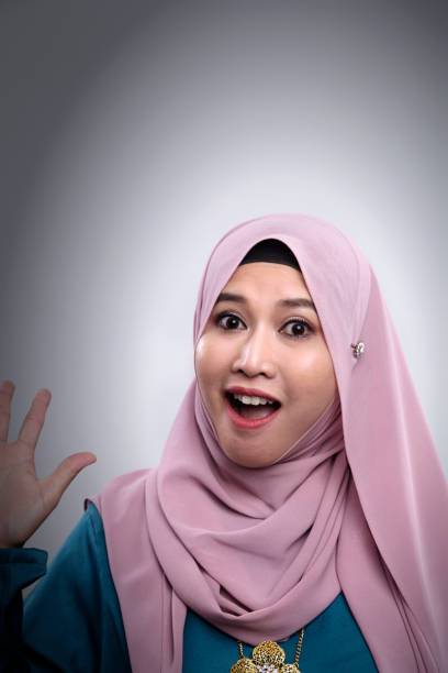 istock front view of malay hijab woman with expression 1155531026