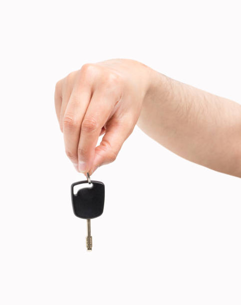 istock Hand giving a car key 1155531851