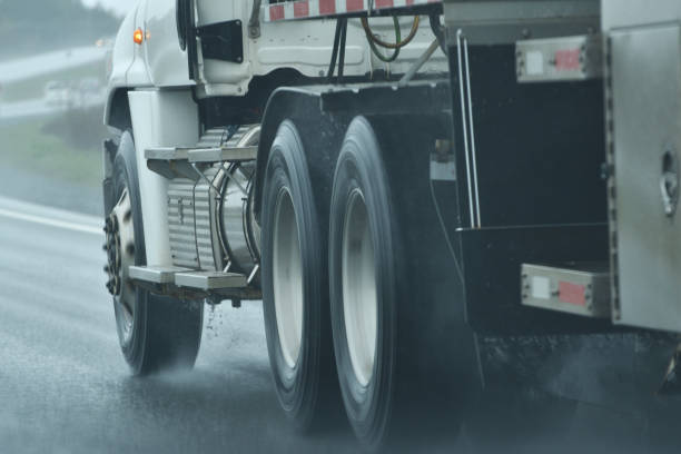 istock Moving Transport Truck on a Wet Highway 1155532797
