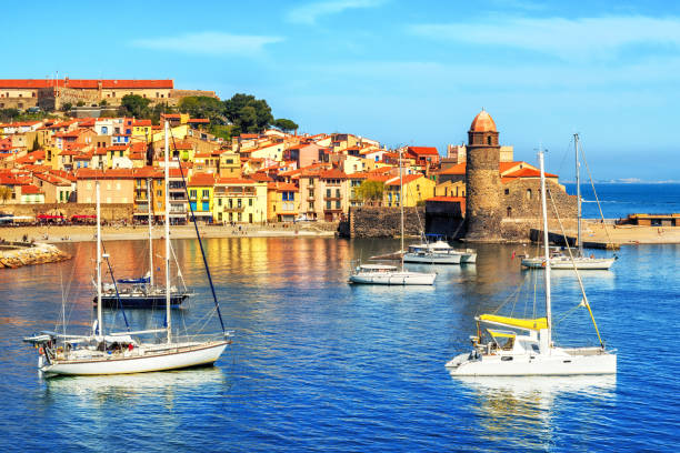 Collioure, France, a popular resort town on Mediterranean sea Collioure, France, a popular resort town on Mediterranean sea, view of the Old town with Notre-Dame des Anges church and the harbor collioure stock pictures, royalty-free photos & images