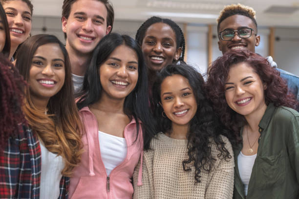 istock Multi-Ethnic Group of University Students Sitting Inside Together 1155533520
