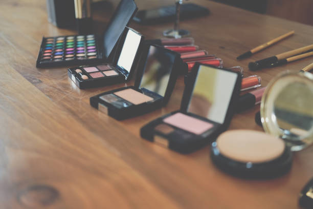 istock beauty cosmetic makeup essentials on stylish artist table 1155534171