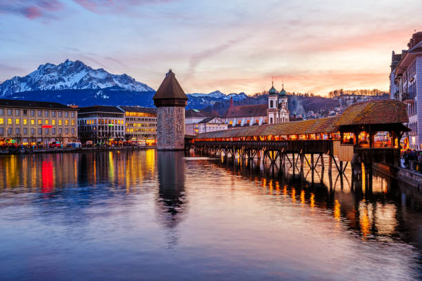 istock Lucerne, Switzerland, historical Old town on dramatical sunset 1155534240