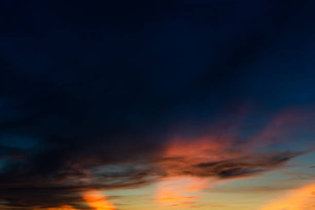 istock colorful dramatic sky with cloud at sunset 1155534275