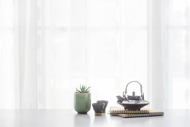 istock Japanese ceramic tea pot and tea cup  on table 1155534292