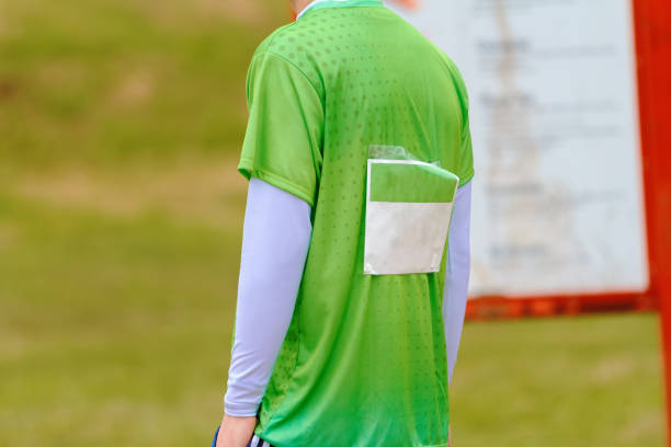 istock Marathon runner with number on his back walks after the race 1155535819