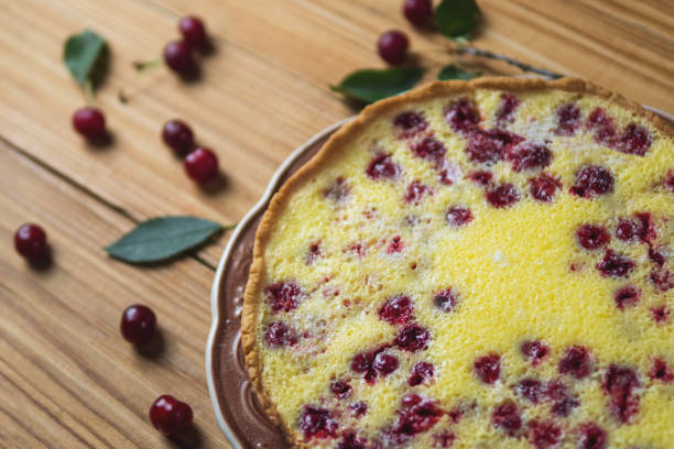 istock Homemade cherry pie on a wooden table 1155536942