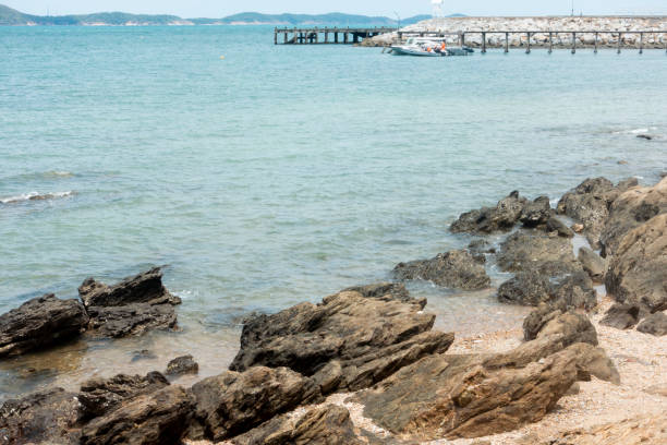 istock sea and stone on the beach 1155537710