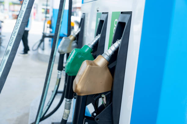 istock Colorful fuel nozzle at Gas station 1155541448