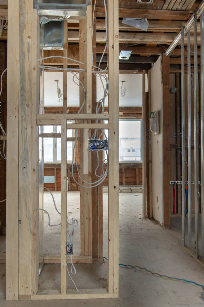 istock Electrical wires connected into a metal box in a residential renovation site 1155545292