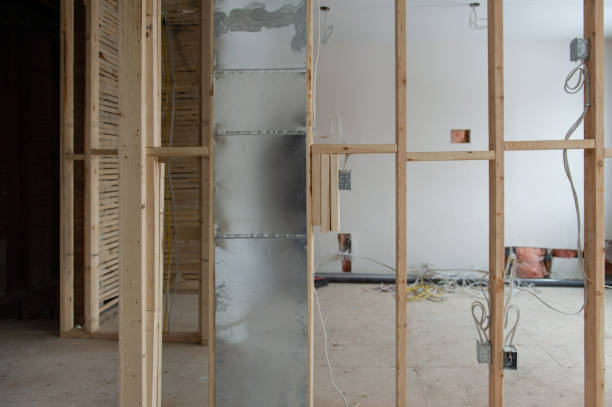 istock Electrical wires connected into a metal box in a residential renovation site 1155545348