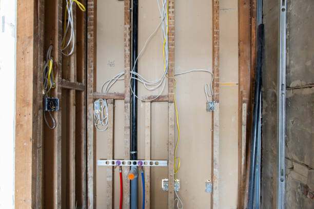 istock Electrical wires connected into a metal box in a residential renovation site 1155545680