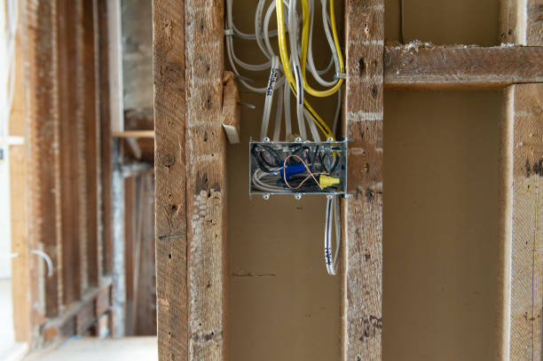 istock Electrical wires connected into a metal box in a residential renovation site 1155545875