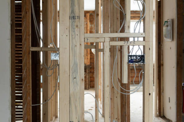 istock Electrical wires connected into a metal box in a residential renovation site 1155546405