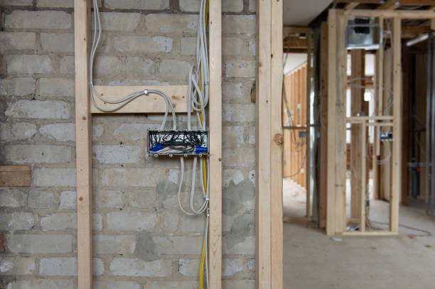 Electrical wires connected into a metal box in a residential renovation site
