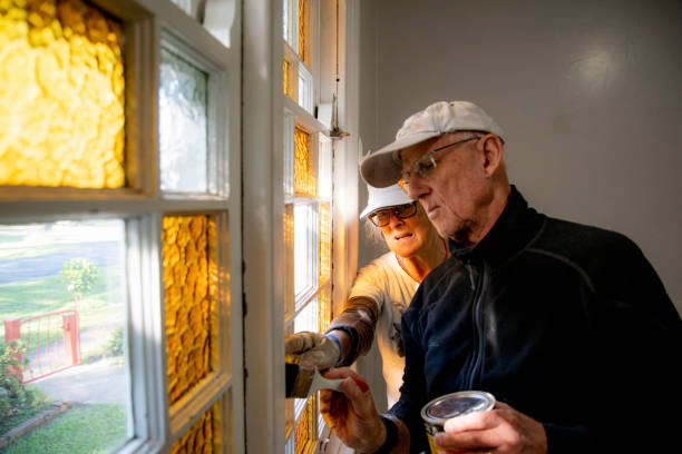 istock Couple renovating their old house. 1155547014