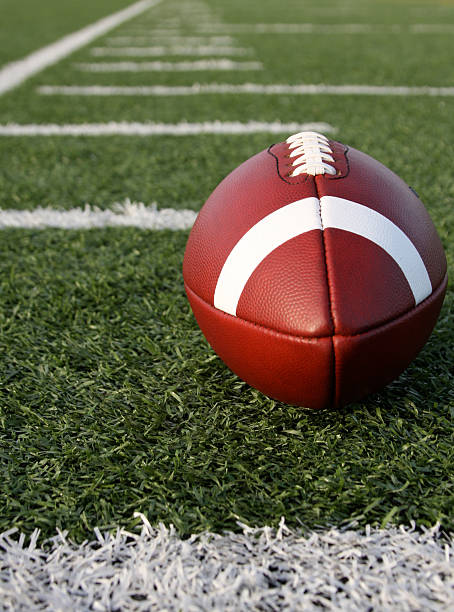 istock Football with the Yard lines Beyond 115554792