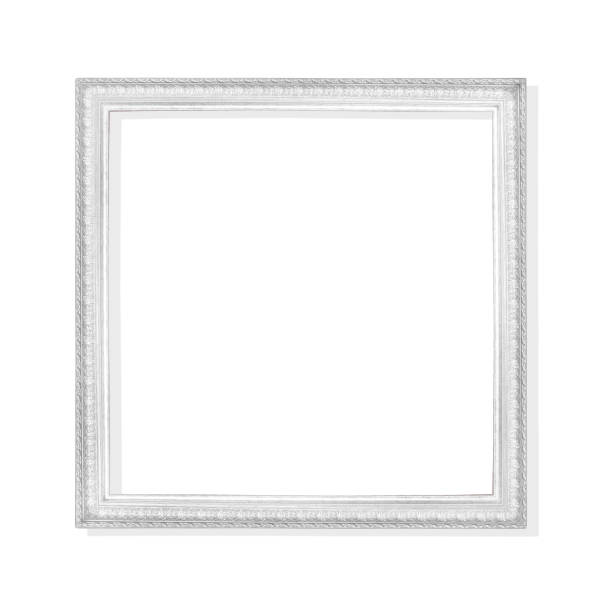 istock Old gray or silver metal picture frame with carving patterns  isolated on white background with clipping path 1155551019