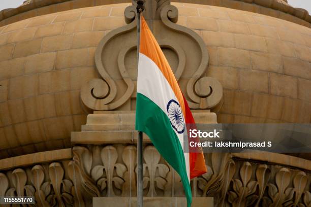 Closeup Of Indian Flag Waving On The Dome Of Vidhana Soudha At Bangaluru India Stock Photo - Download Image Now
