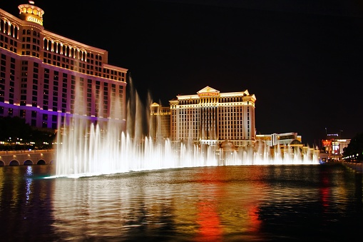 Las Vegas, USA - May 2, 2007: The Caesars Palace Hotel is shown behind some of the fountains of the Bellagio Hotel (not shown) on May 2, 2007 in Las Vegas. Caesars opened in 1966