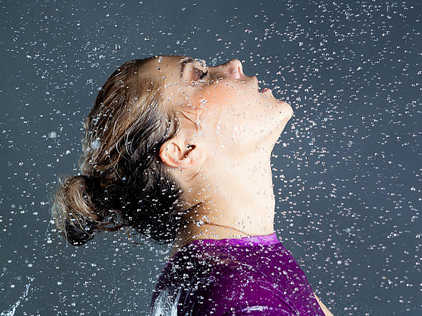 istock expressive woman with falling water droplets 115556269