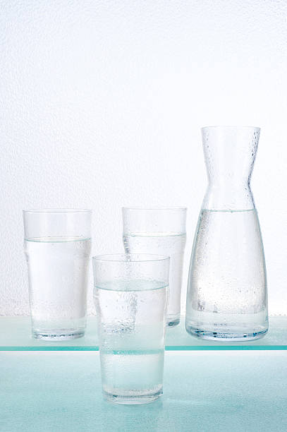 istock glasses and carafe with water 115556720