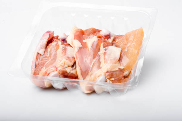 istock Chicken thighs in plastic pack from supermarket, ready to cook. 1155570092