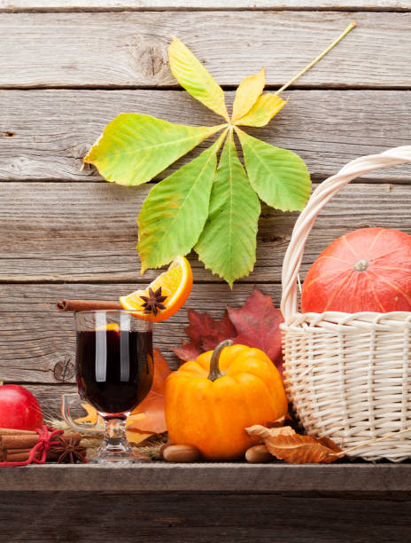 istock Autumn still life with mulled wine and pumpkins 1155571021