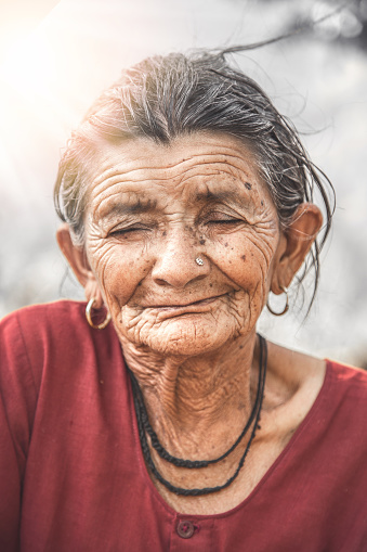 Close up Portrait of an Cheerful Rural Old Indian Women