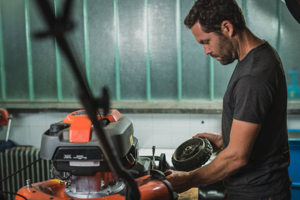istock Repairing a wheel on a lawnmower 1155573121
