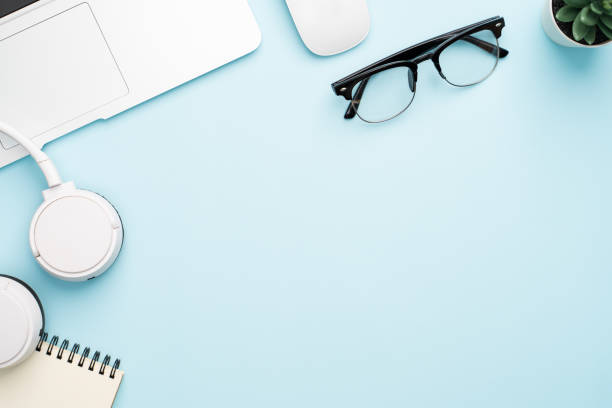 istock Top view with copy space of office desk with accessories 1155576372